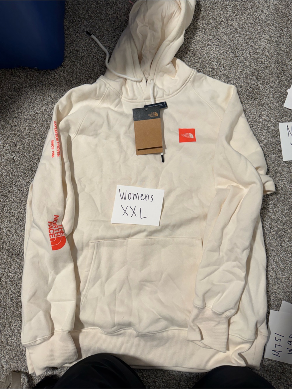 The North Face Women's Cream Hoodie with Red Logo Details